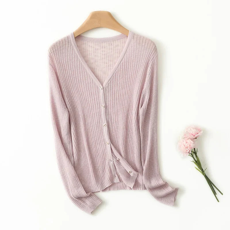 Elegant women's lightweight V-neck cardigan sweater. Chic & comfortable, great for versatile spring outfits.