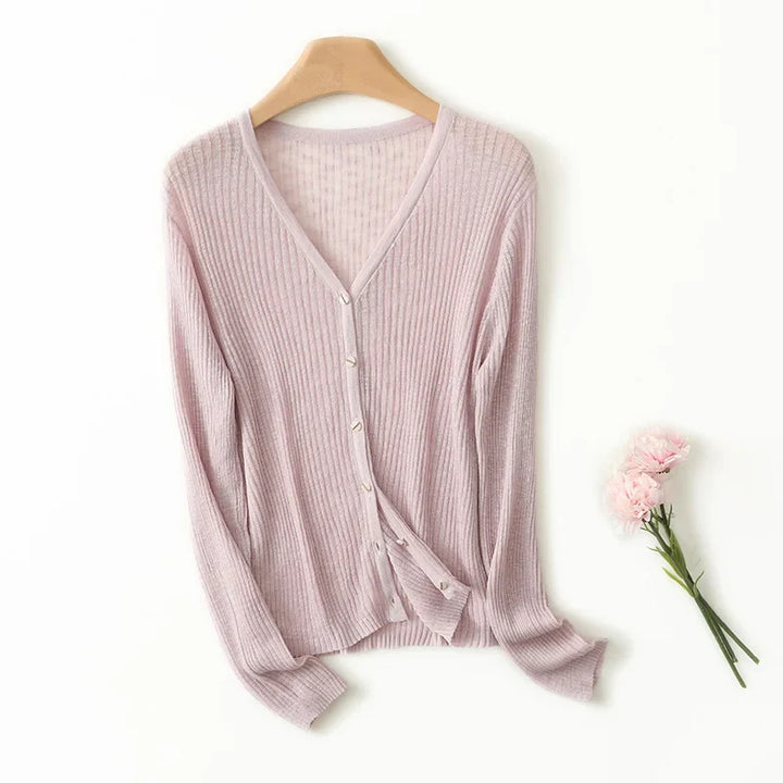 Elegant women's lightweight V-neck cardigan sweater. Chic & comfortable, great for versatile spring outfits.