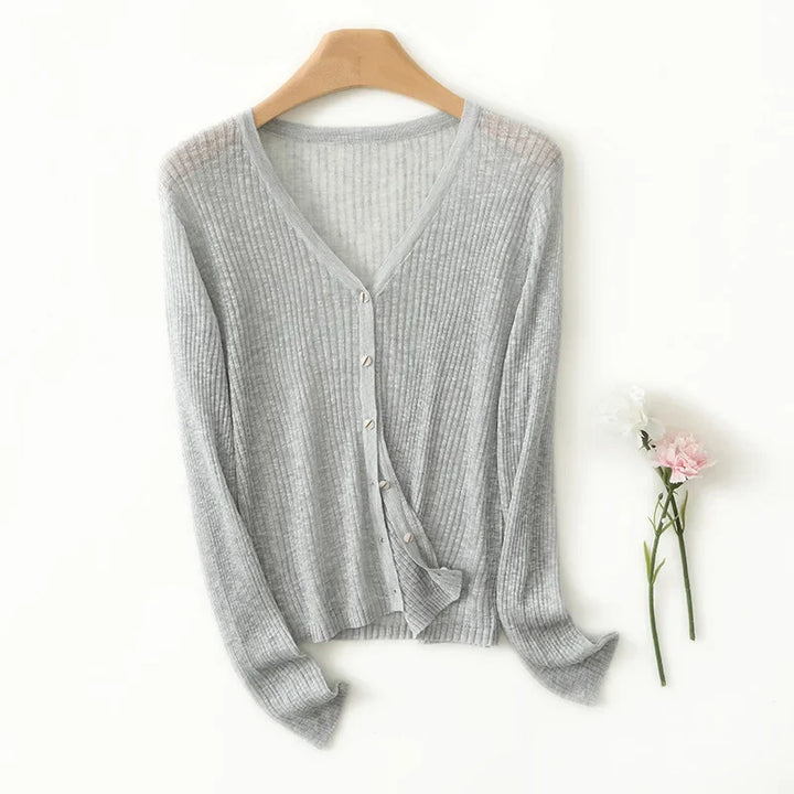 Soft knit women's lightweight V-neck cardigan sweater. Comfortable and breathable for all-day wear in spring.
