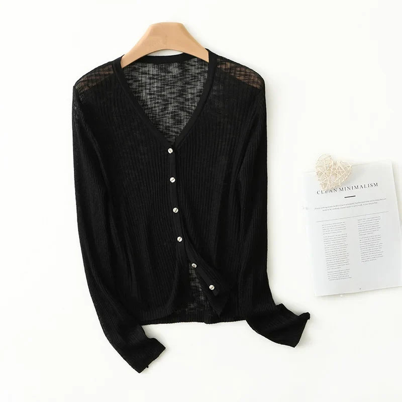 Stylish women's lightweight V-neck cardigan, a comfortable layering sweater for casual or elegant spring looks.