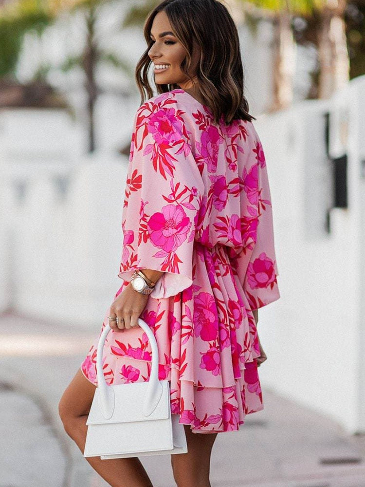 Stylish V-neck mini dress for women, a lightweight and airy choice for summer fashion.