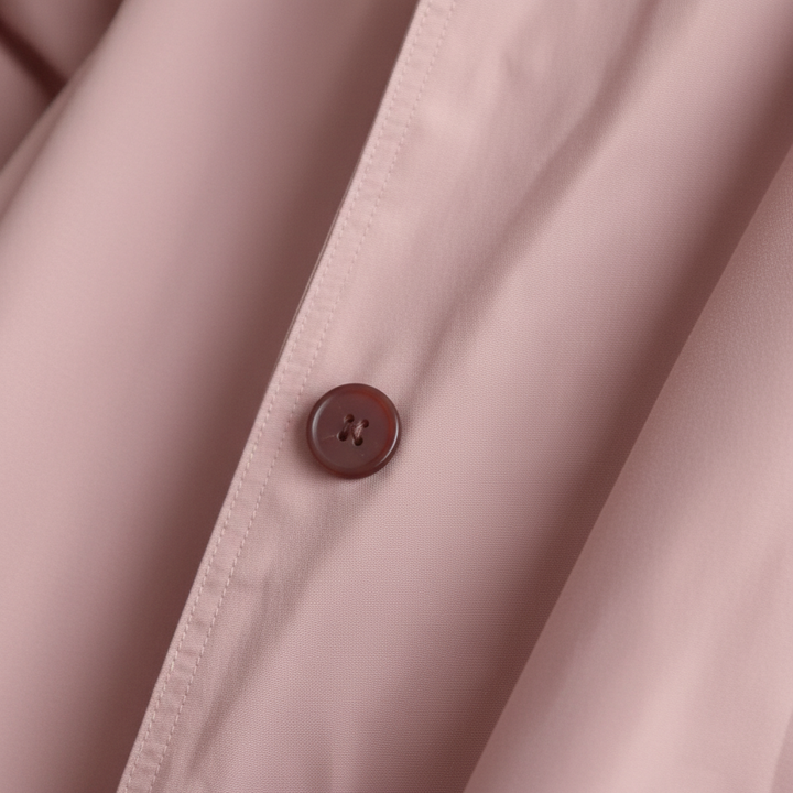 Close-up of the water-repellent fabric on the women's Ruth rain jacket, ideal for outerwear