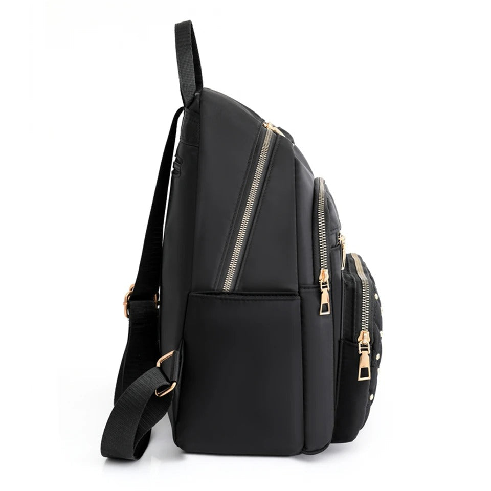 Student carrying women's lightweight nylon school backpack on campus. Water-resistant, ideal for books & daily essentials.