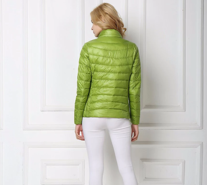 Soft & comfortable women's lightweight waterproof jacket for ultimate all-season comfort.