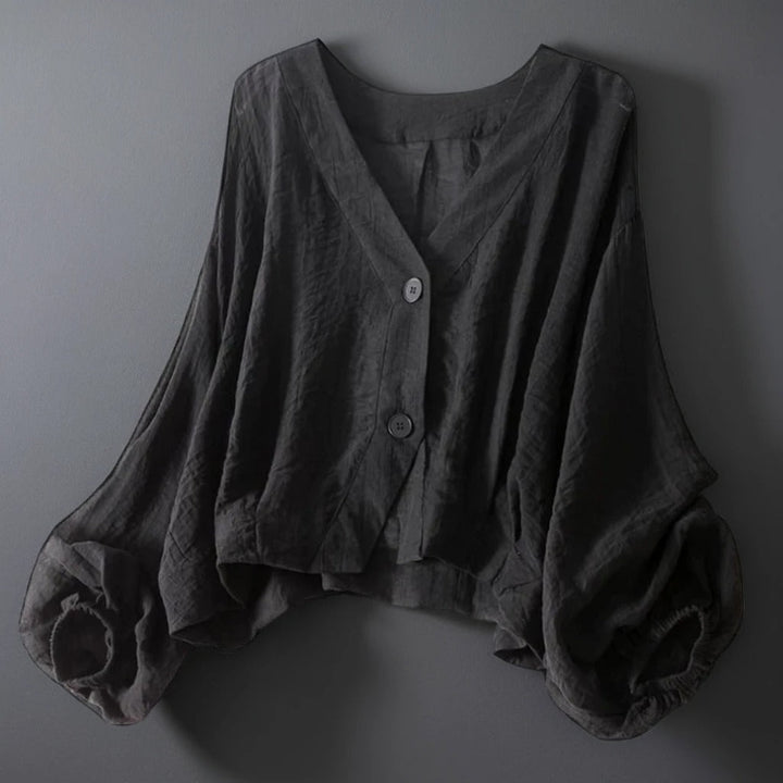 Elegant black women's blouse, a lightweight top with relaxed fit and stylish balloon sleeves for casual chic.