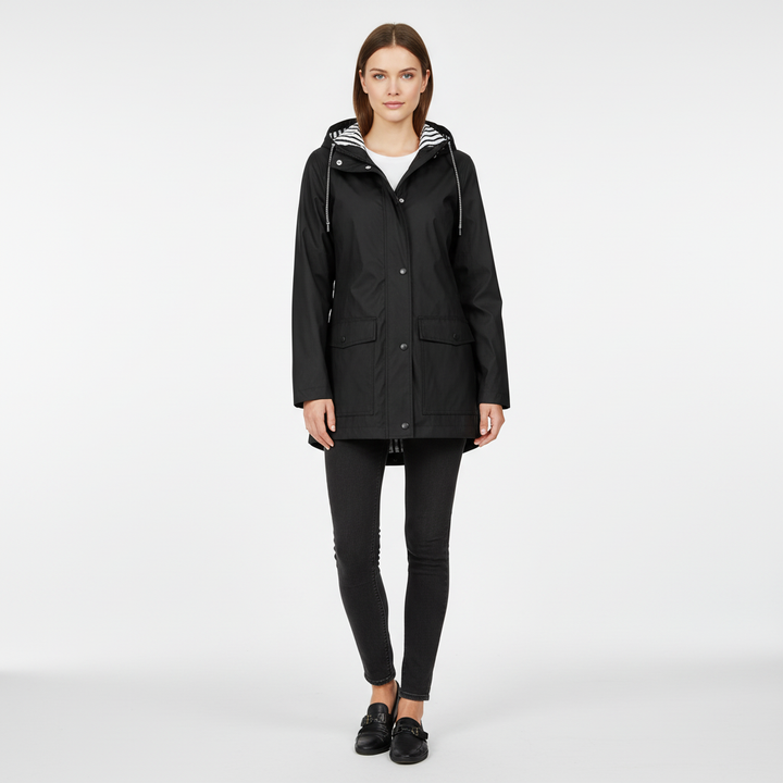 Detail of the hood on a women's versatile rain jacket, designed for optimal coverage.