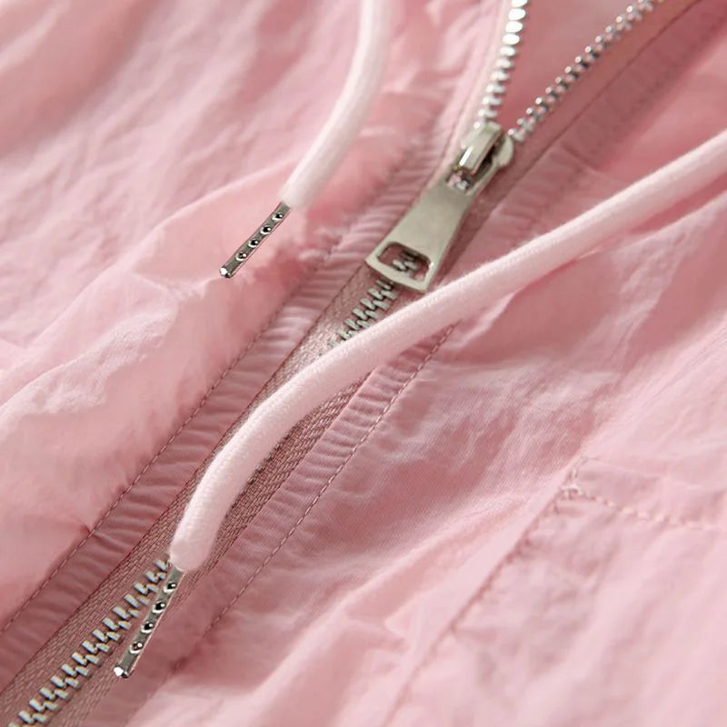 White lightweight women's zip-up hoodie for ultimate comfort. Versatile, breathable casual wear & athletic style.