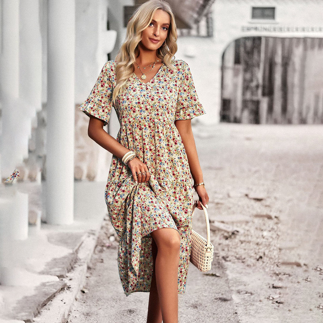 Women's lilac floral print midi dress, perfect for effortless summer style and versatile occasions.