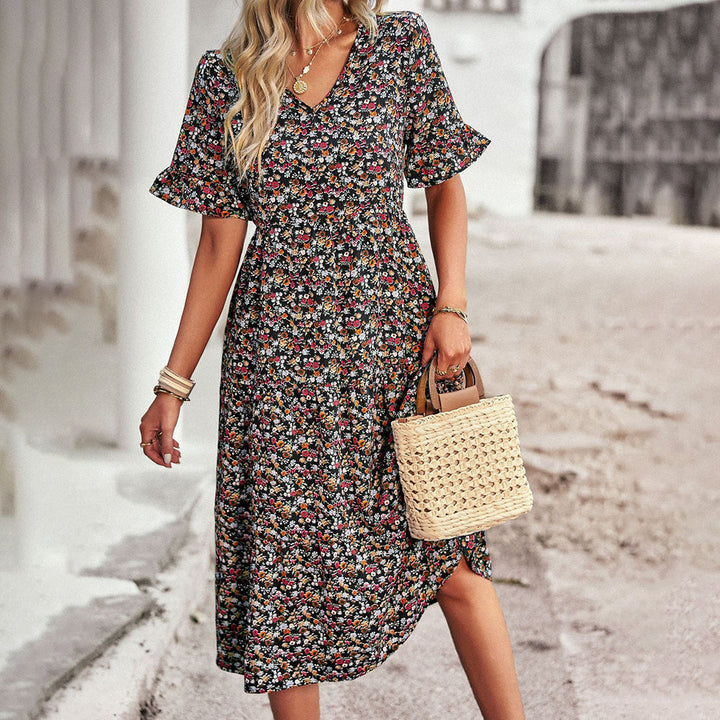 Elegant women's floral midi dress in lilac, ideal for summer events, vacations & flattering fit.