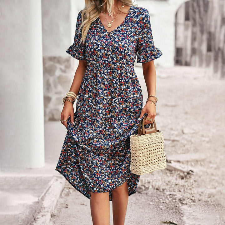 Comfortable women's lilac floral print midi dress, great for casual wear & stylish summer fashion.