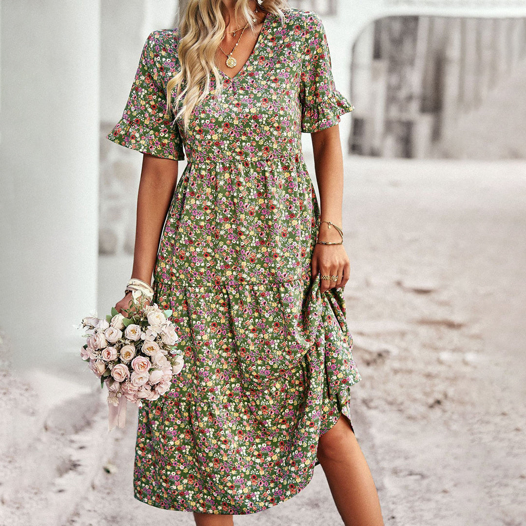 Vibrant lilac floral print midi dress for women, offering effortless summer style & colorful design.
