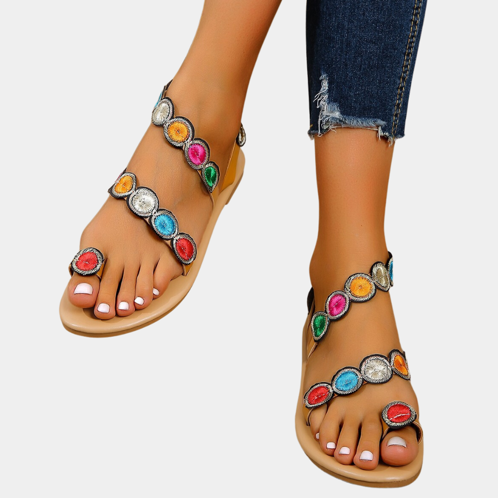 Lina women's lightweight and comfortable summer flat sandals, essential casual footwear for warm days.