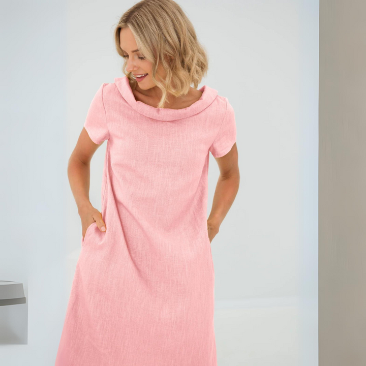 Back view of a women's LinaLuft linen blend summer dress, showcasing its flowy silhouette
