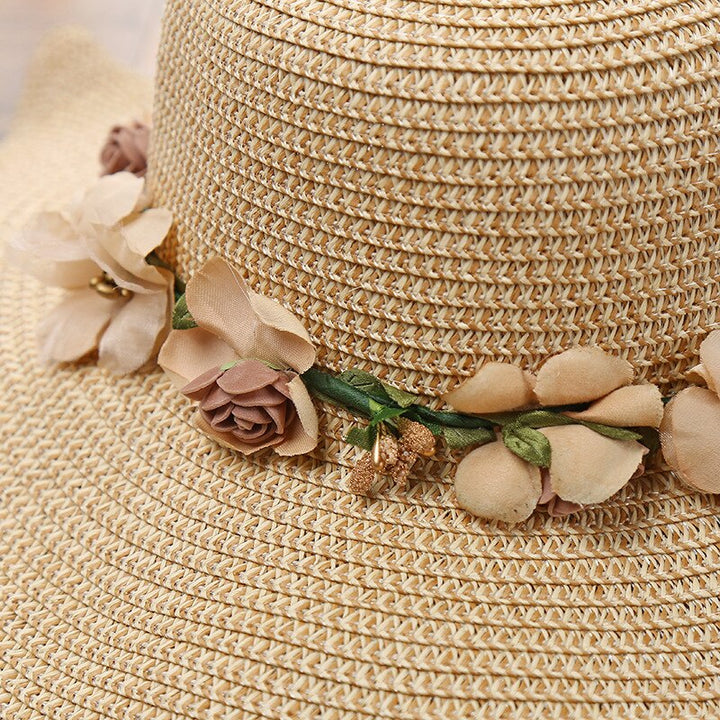 Side view of a women's Liora summer hat featuring a beautiful floral pattern and wide brim for sun protection