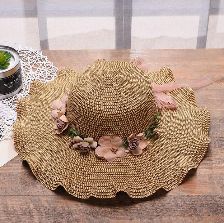 Fashionable Liora women's floral summer hat, offering sun protection and a stylish look for any occasion