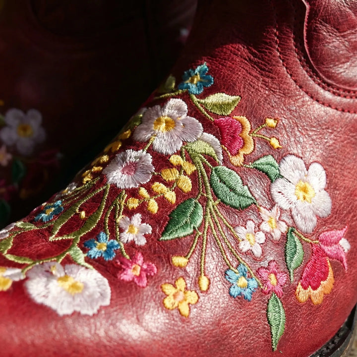 Boho chic women's floral embroidered western ankle boots, ideal festival footwear & statement boots.