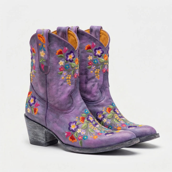 Elegant floral embroidered ankle boots for women, embodying boho chic and classic western style.