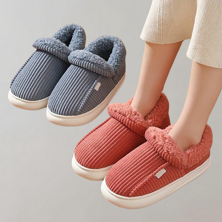 Top view of Livia women's warm slippers, soft & cozy house shoes on a rug for ultimate comfort.