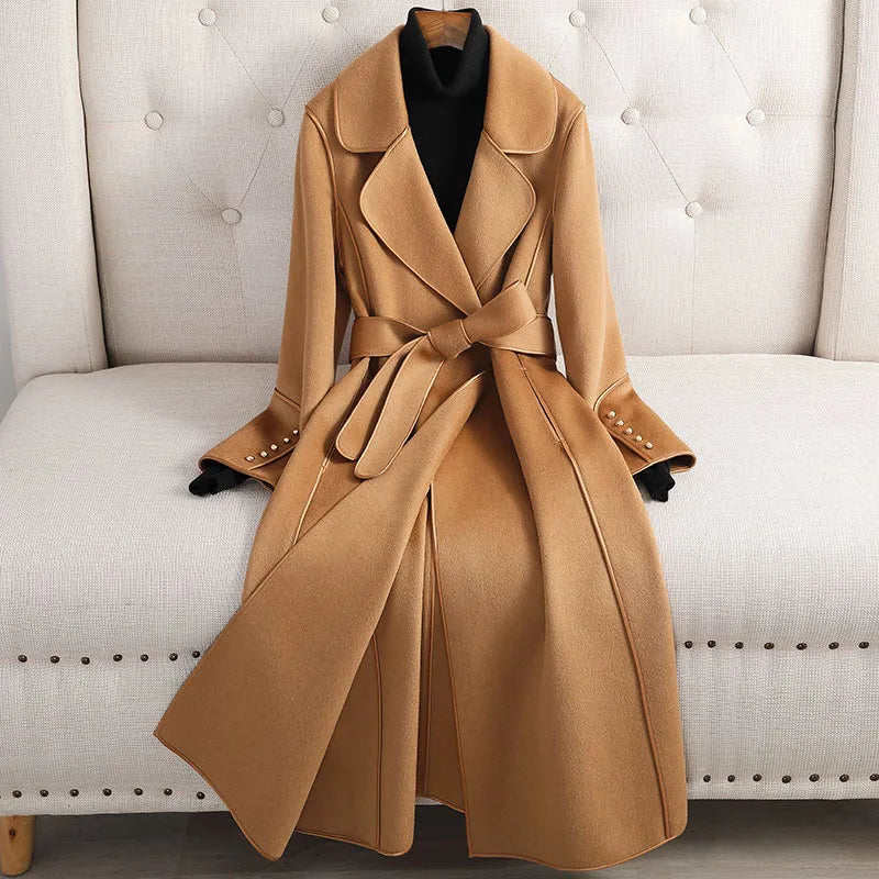 Women's long belted tailored trench coat, perfect for formal & casual wear. Classic fall & winter outerwear.