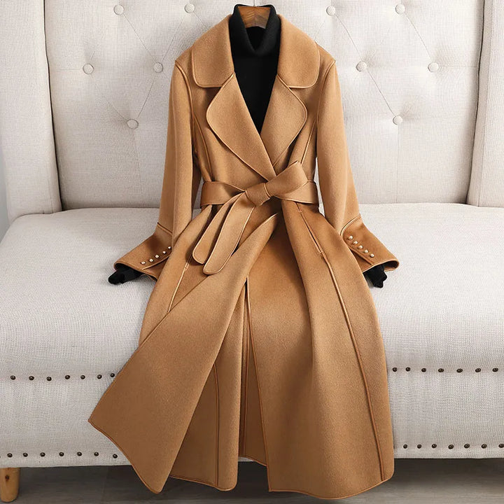 Women's long belted tailored trench coat, perfect for formal & casual wear. Classic fall & winter outerwear.