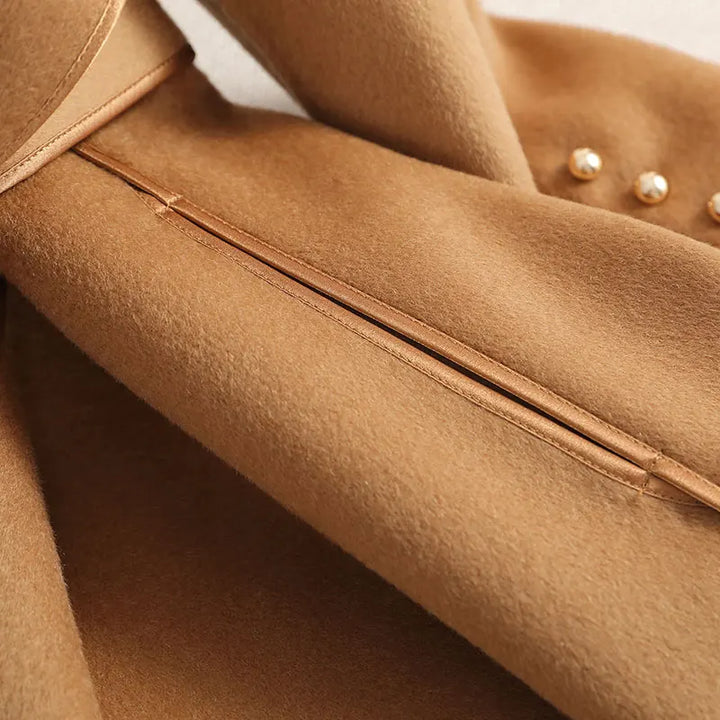 Versatile women's long belted trench coat. Tailored fit for both formal and casual office wear & winter style.