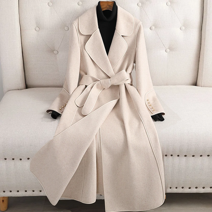 Stylish women's long trench coat with a belt, tailored for an elegant look. Perfect fall & winter jacket.