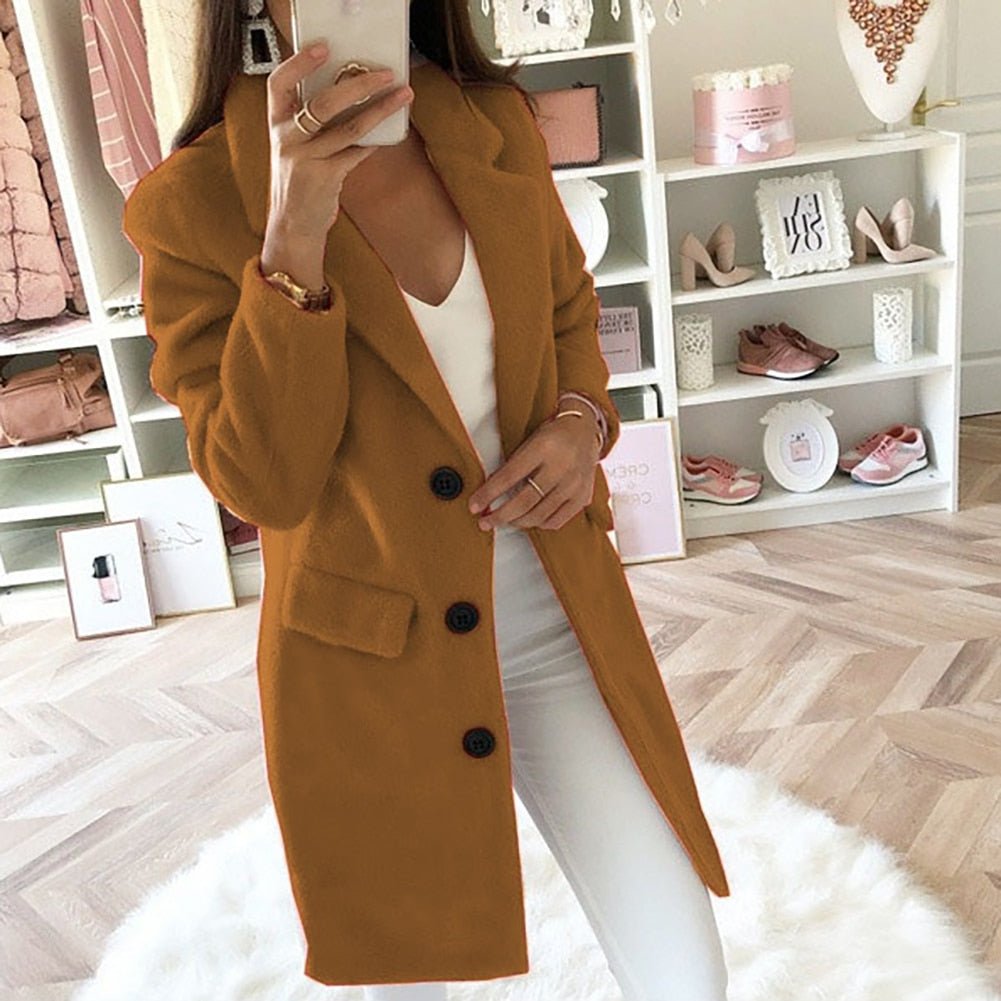 Chic women's longline blazer, versatile and stylish fashion outerwear.