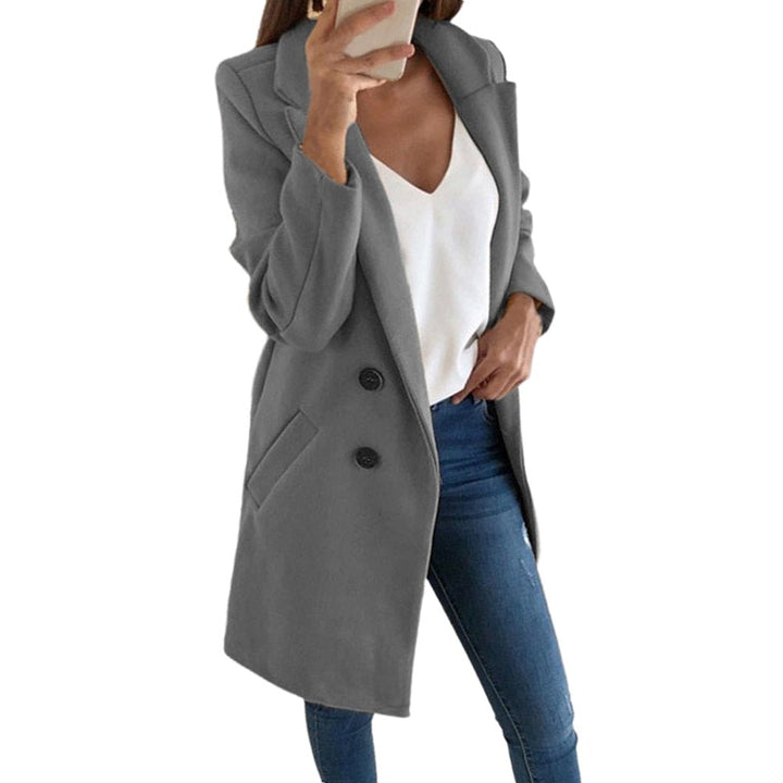 Versatile chic women's long blazer coat, elegant outerwear for autumn/winter.