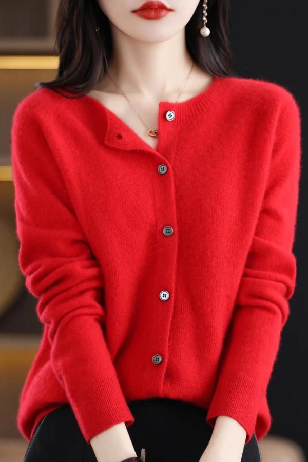 Warm women's long button-front cardigan. An essential cozy layer for transitional and everyday comfort.