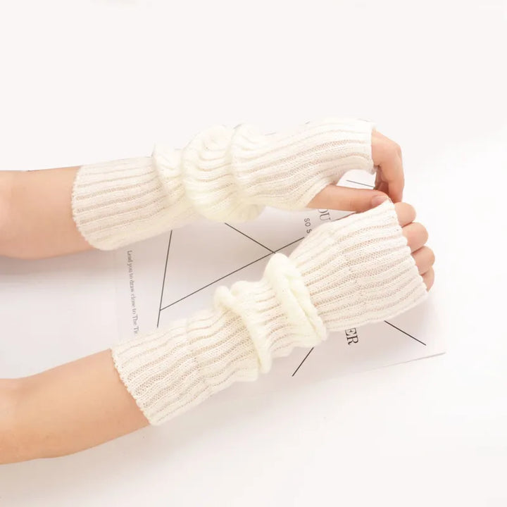 Soft cotton long fingerless knitted arm warmers for women, ideal for texting and keeping arms warm in winter.