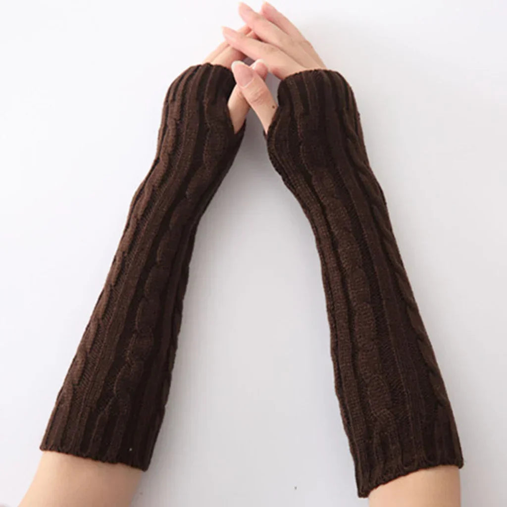 Cozy long fingerless knitted gloves for women, great for texting and staying warm during cold winter weather.