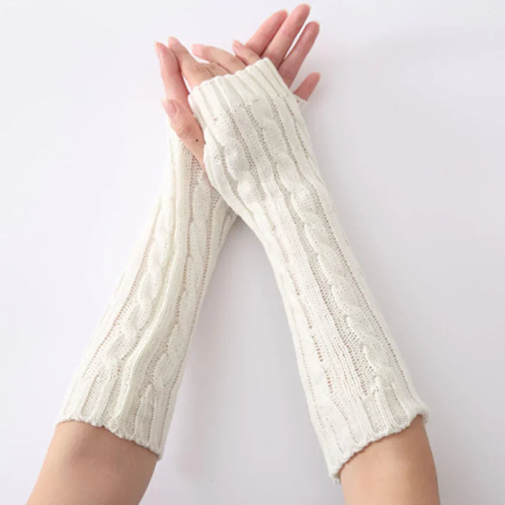 Fashionable long fingerless knitted winter gloves for women, offering warmth without sacrificing style or mobility.