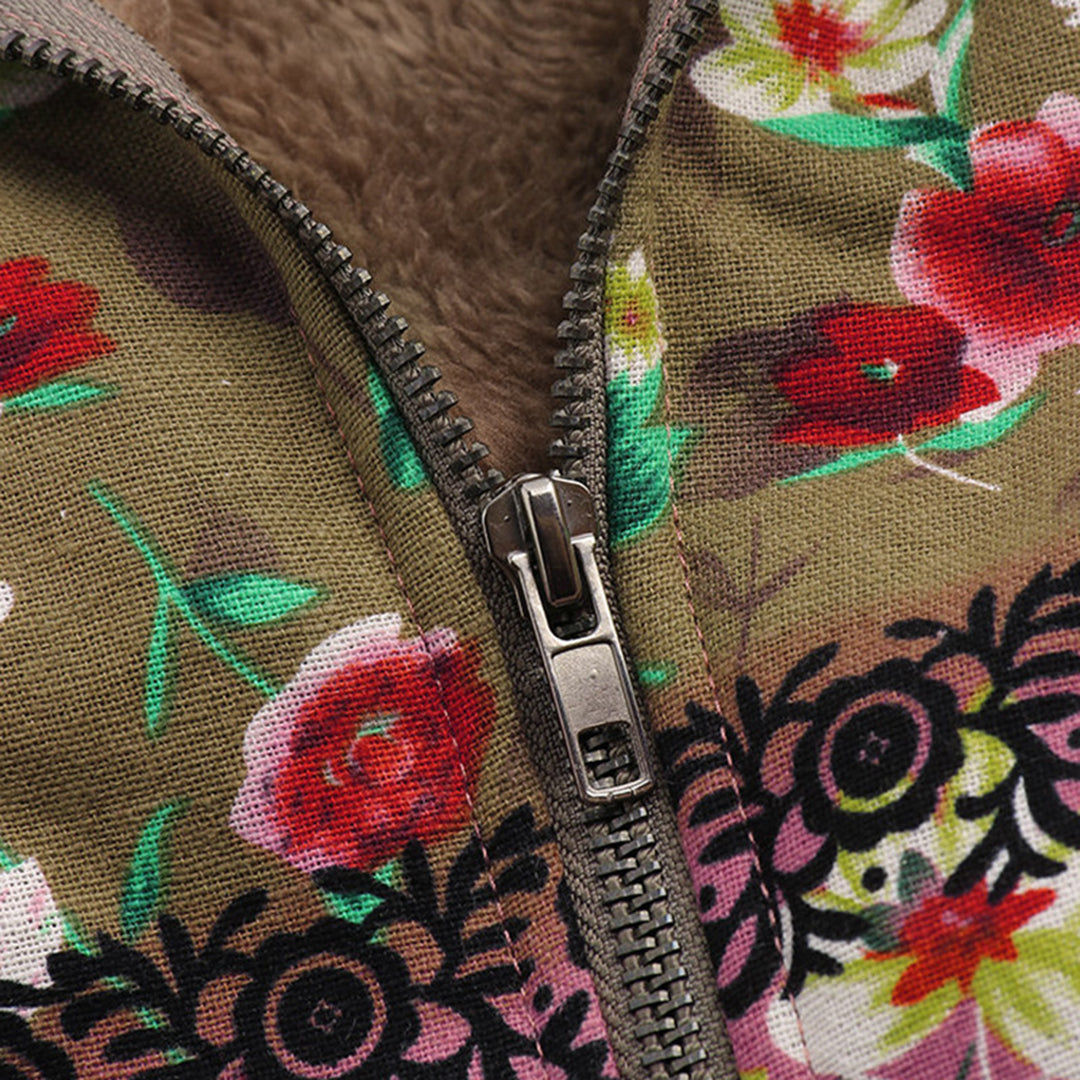 Long women's teddy coat with hood & subtle floral pattern, perfect blend of warmth & elegance.