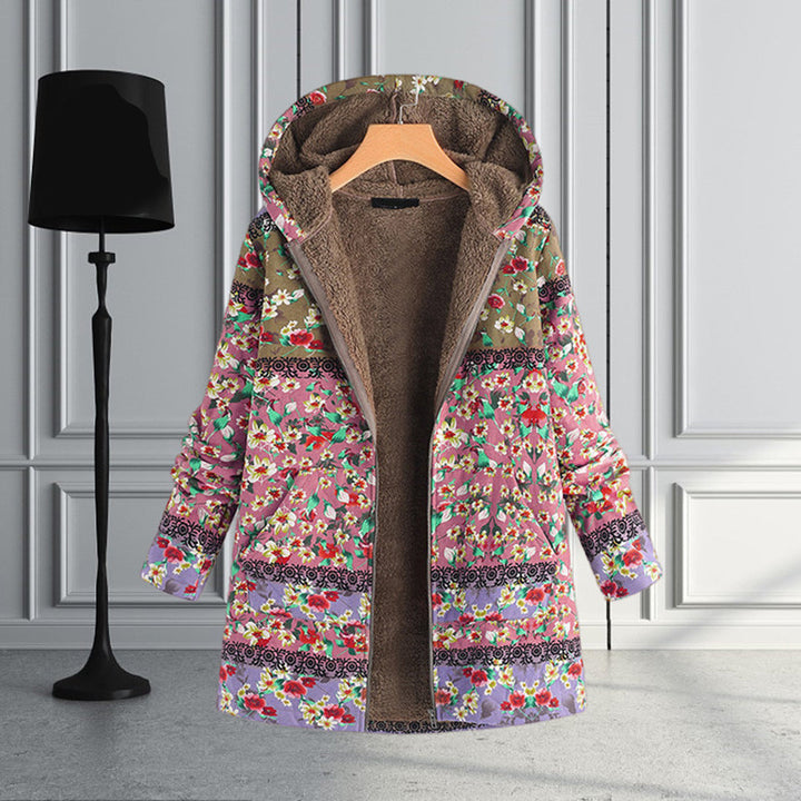 Warm women's long hooded teddy jacket, soft and comfortable for cold weather style.