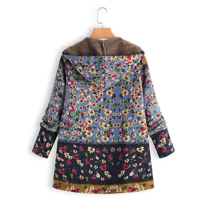 Fashionable women's long teddy coat with hood, designed for ultimate coziness and winter flair.