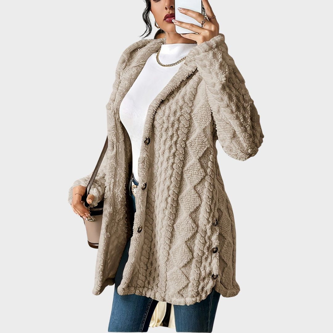 Elegant women's loose fit textured long coat with hood & buttons, perfect casual outerwear.