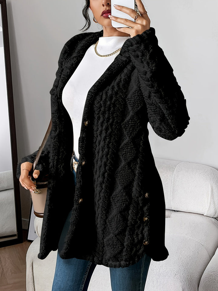 Women's button-front long hooded coat, textured design, versatile for fall & winter fashion outerwear.