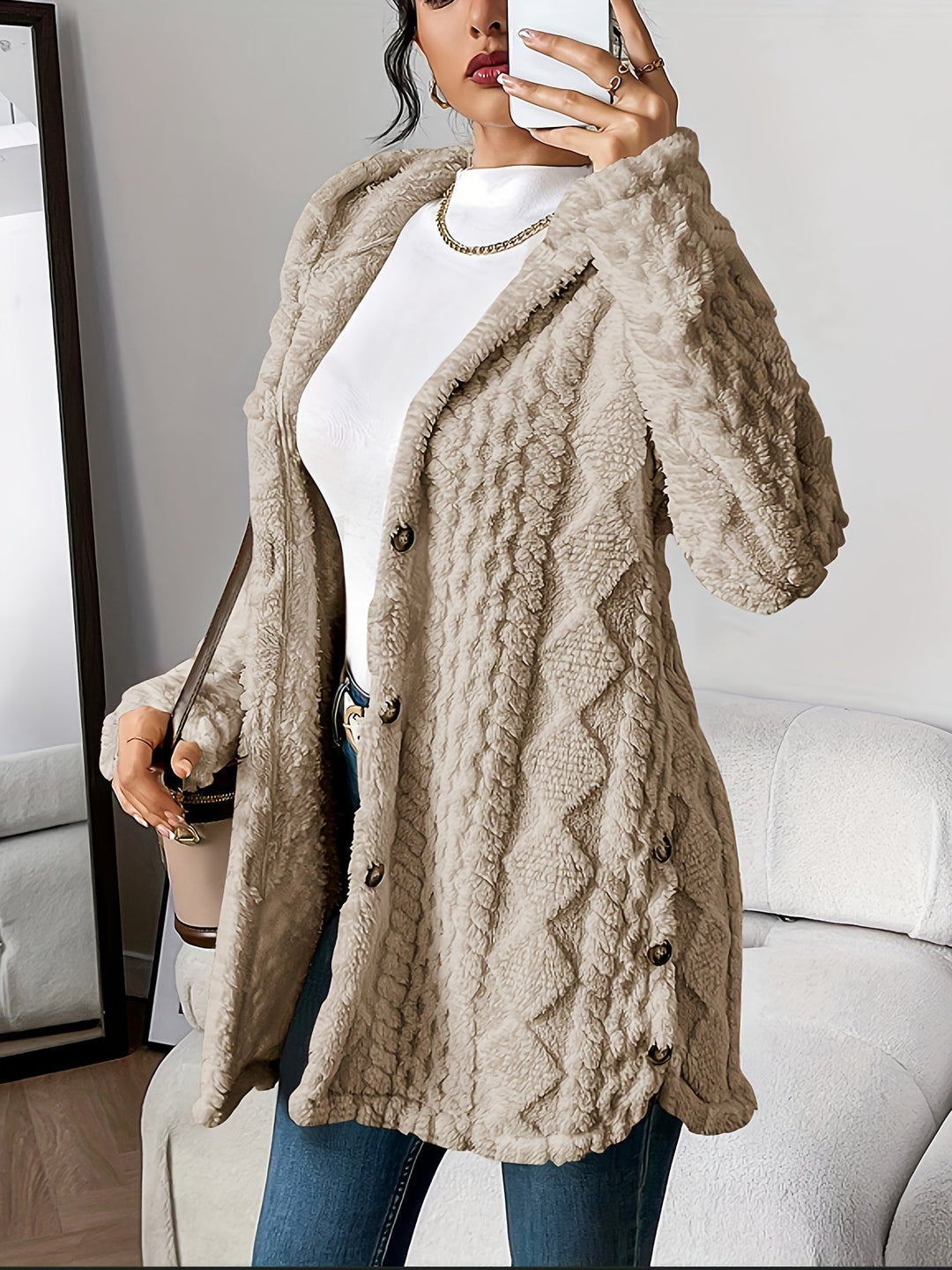 Fashionable women's long textured hooded coat with button front, essential for fall & winter outfits.