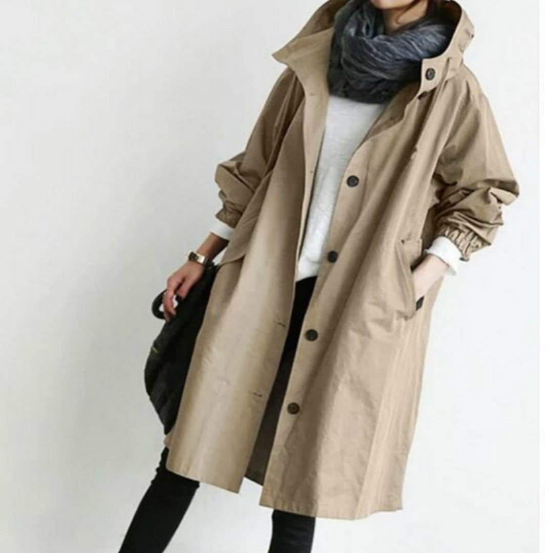 Full-length women's hooded trench coat. A classic rain jacket design for fashion and weatherproofing.