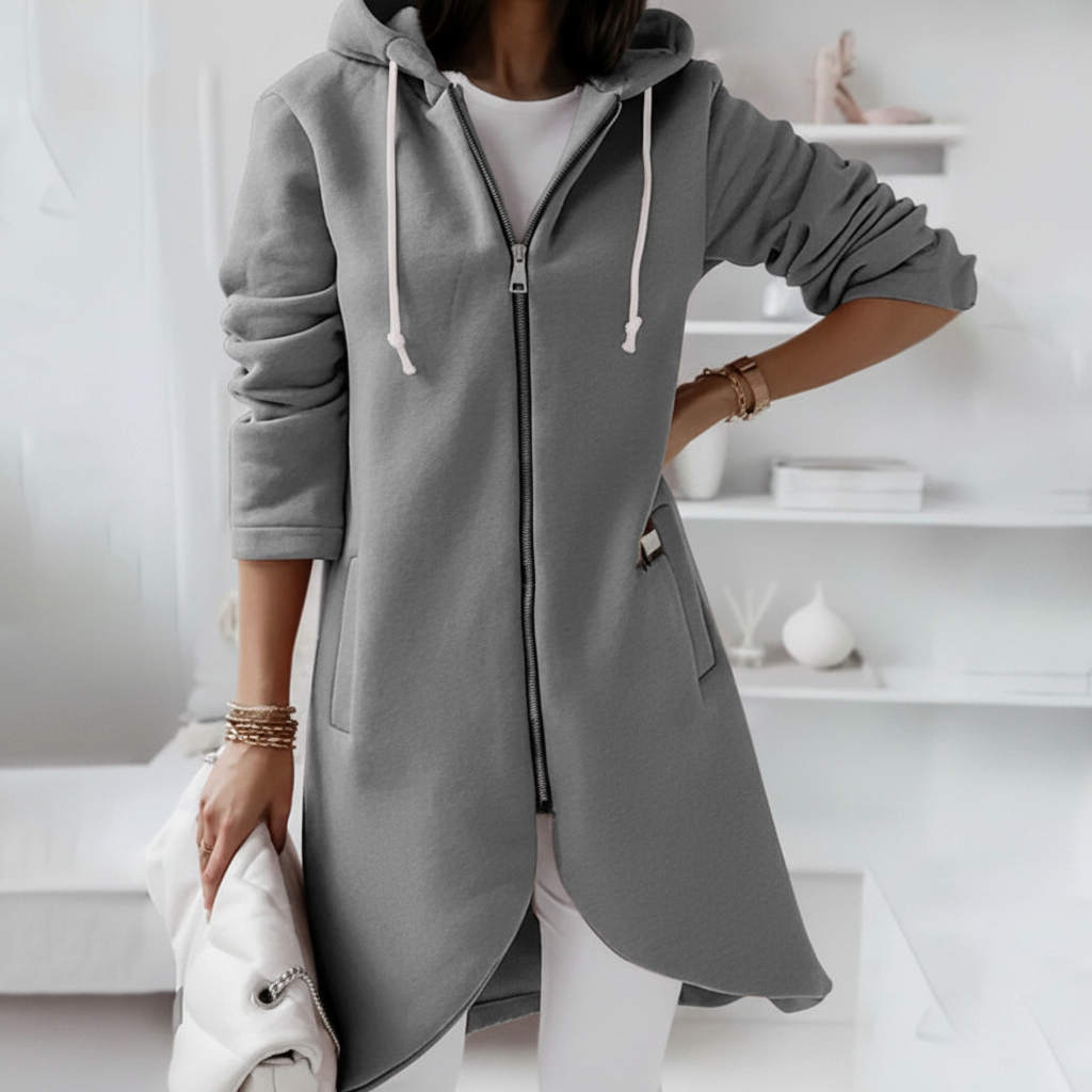 Casual women's long hooded vest in neutral color, offering comfort and style for everyday outfits