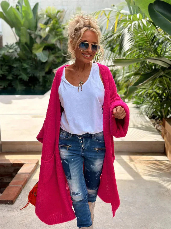 Vibrant longline bohemian cardigan for women, featuring a unique open front and oversized design.