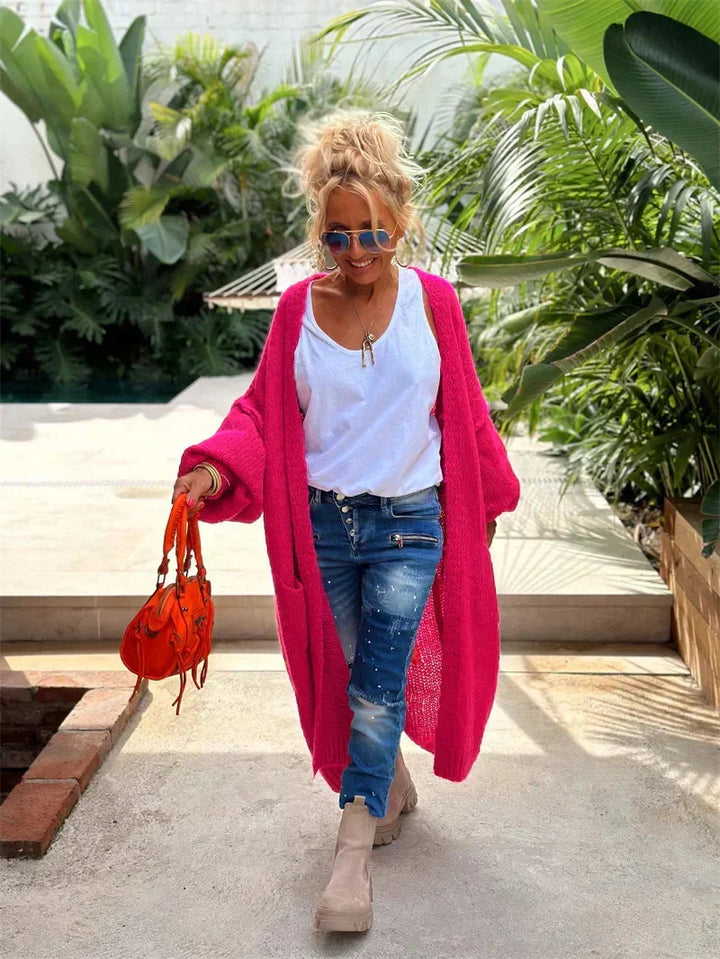 Relaxed fit women's oversized knit cardigan, a bohemian statement piece with hippie style.