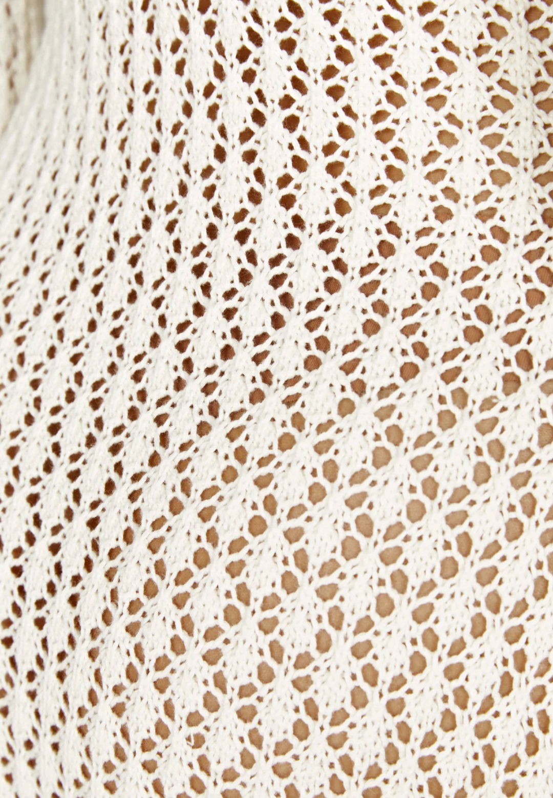 Women's long-sleeve crochet maxi dress for elegant summer beachwear or resort style, lightweight and chic.