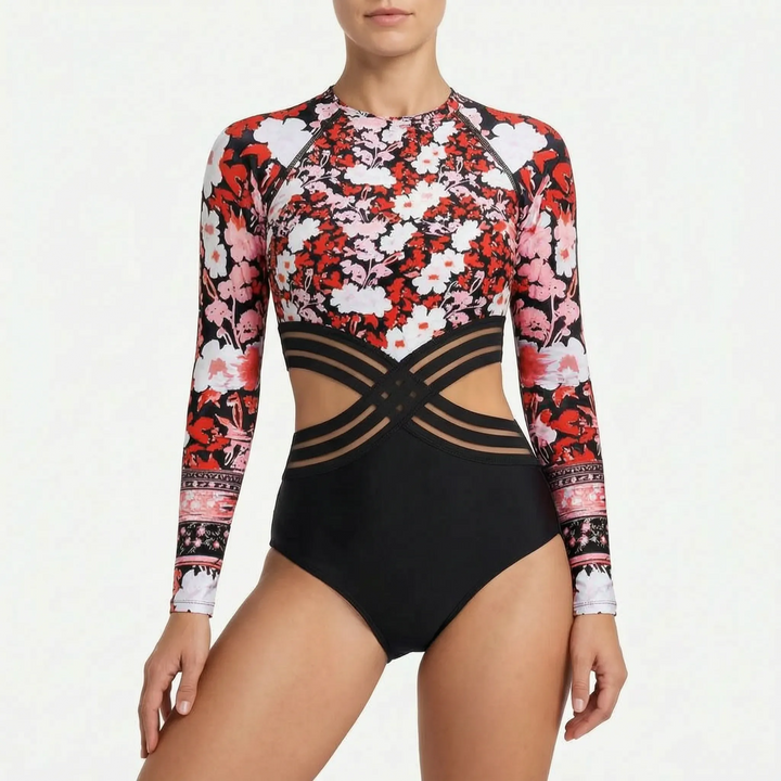 Trendy women's long-sleeve cutout one-piece for sun protection & modern style at the beach or pool.