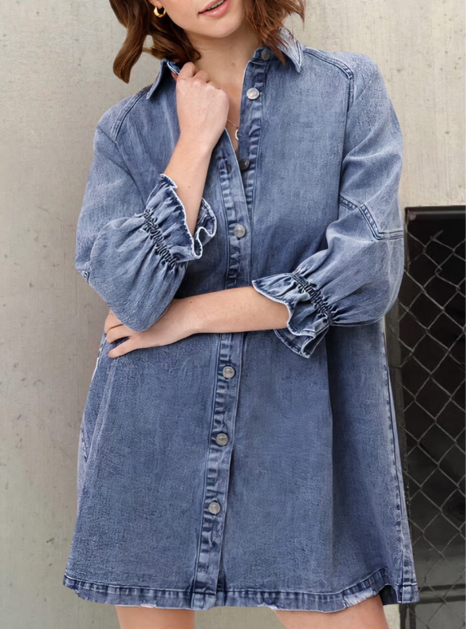 Classic denim long sleeve shirt dress for women. Features a button-front, perfect for versatile daily style.