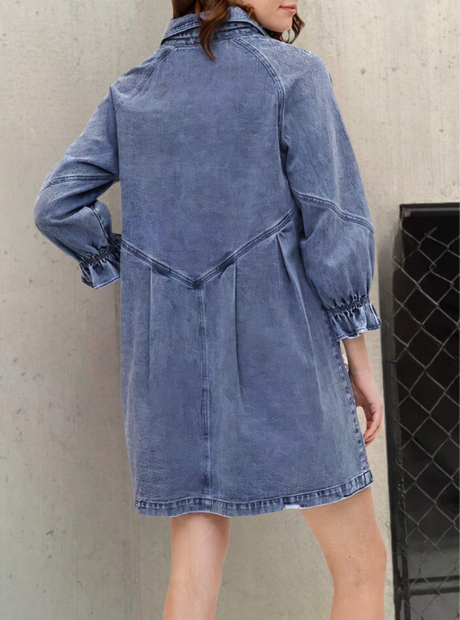 Fashionable women's long sleeve button-front shirt dress in durable denim. A comfy midi for casual outings.