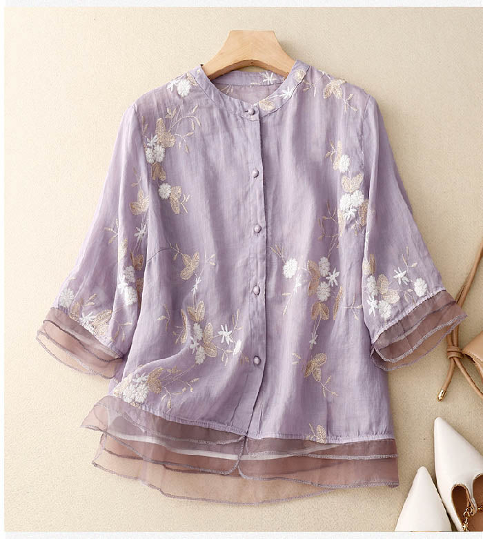 Sophisticated women's floral blouse, a versatile top for spring fashion and summer wear.