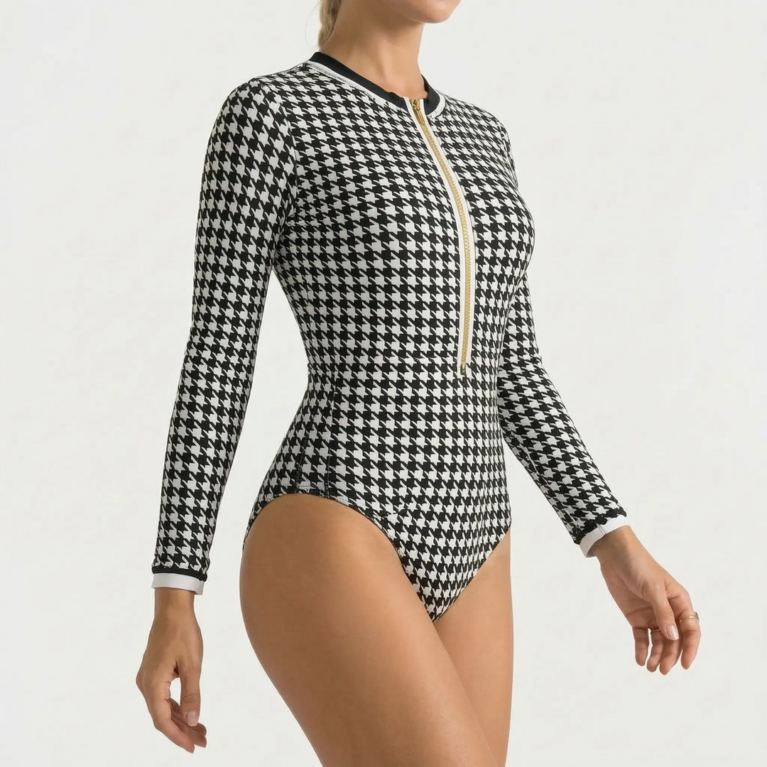 Women's long-sleeve zipper one-piece swimsuit, perfect for active water activities & sun.