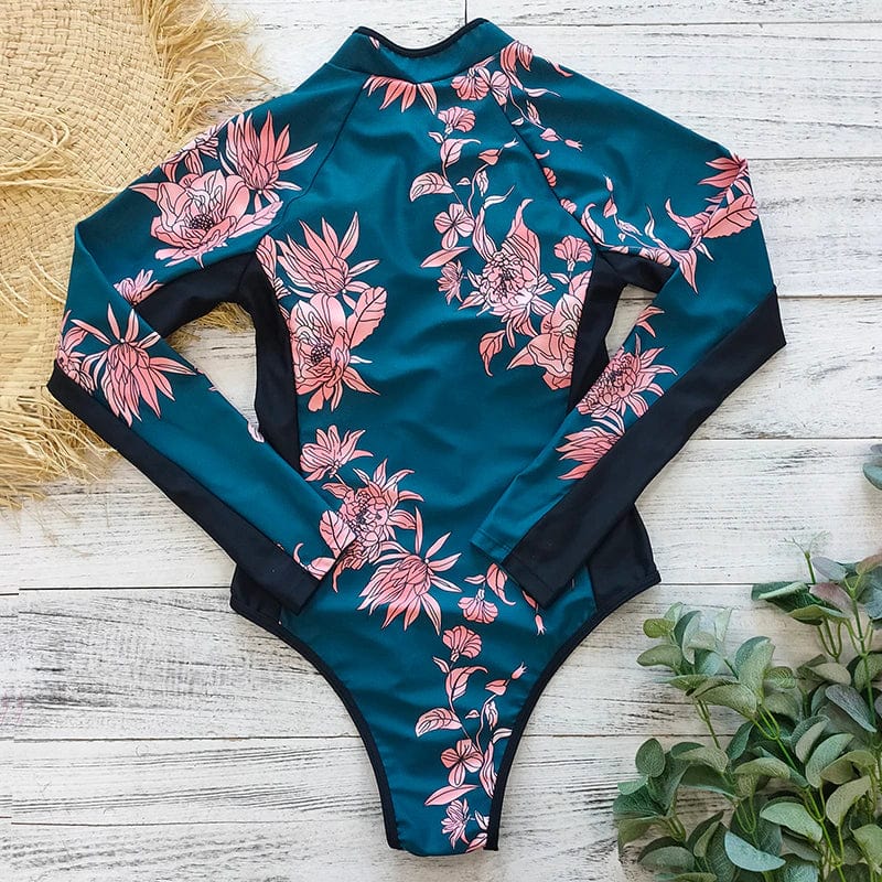 Trendy women's full coverage long sleeve swimsuit, perfect for beach and water sports.