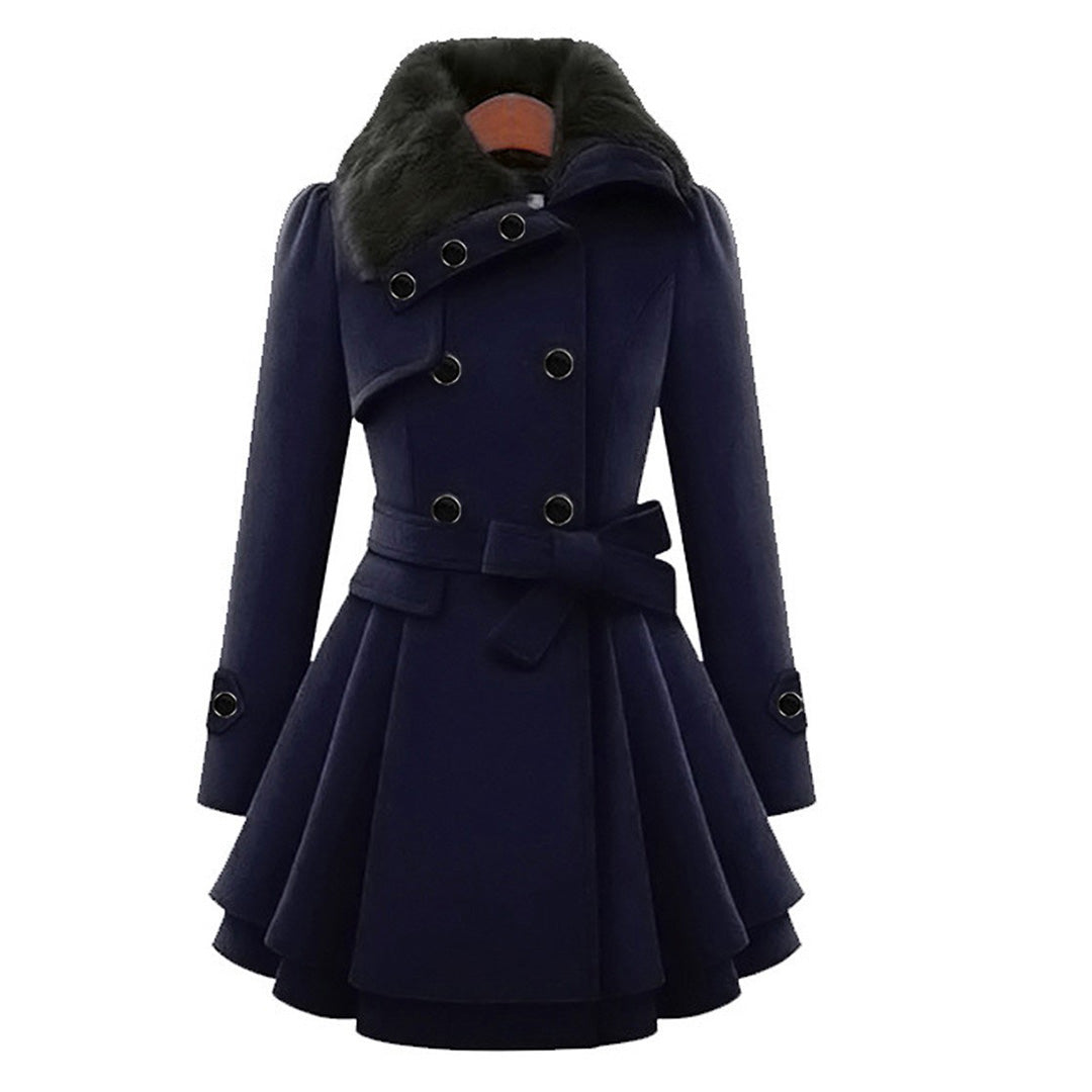 Warm winter essential: Ladies long coat featuring a cozy faux fur collar. Elegant and comfortable cold weather outerwear.